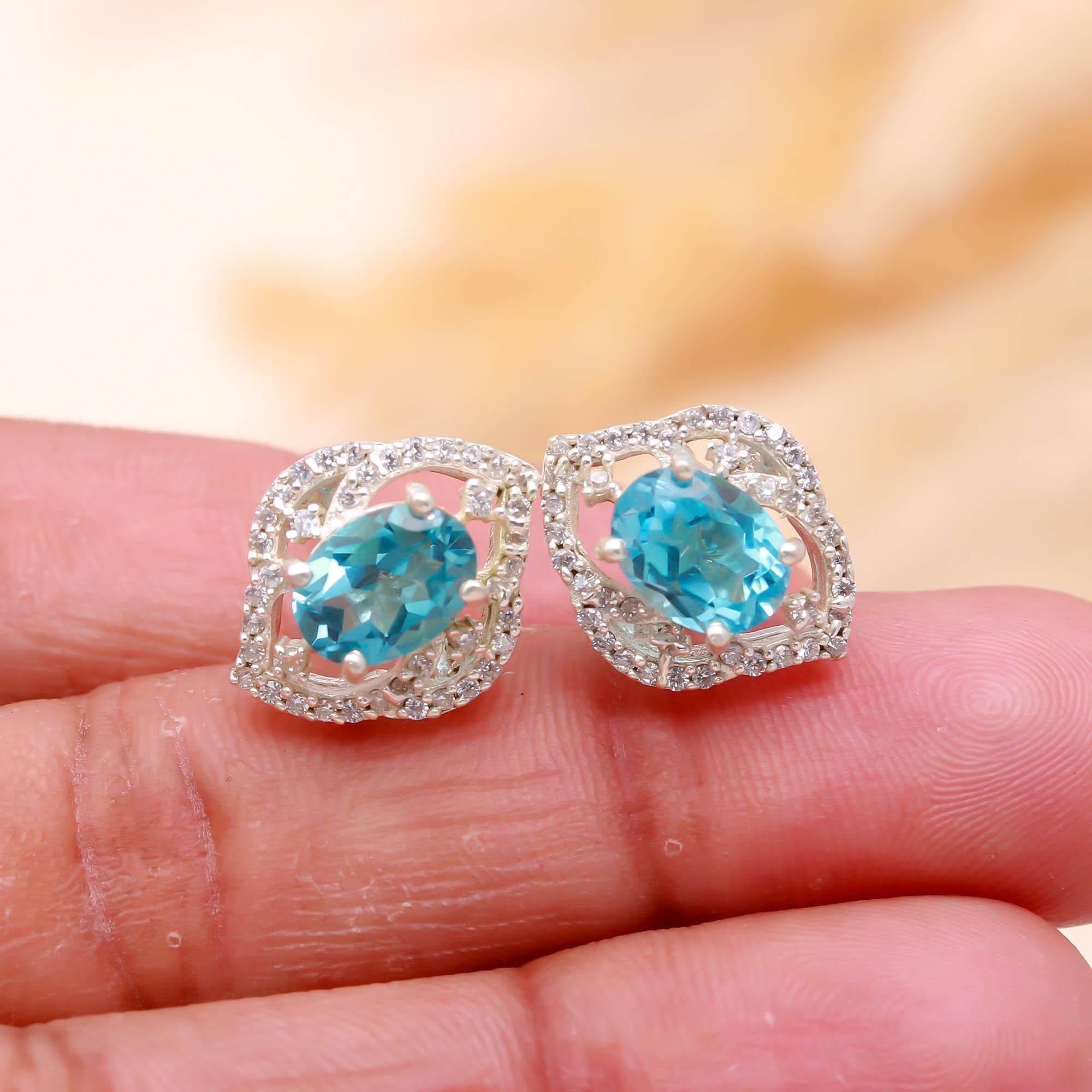 Sky Sparkle: Blue Topaz and Zircon Silver Stud Earrings