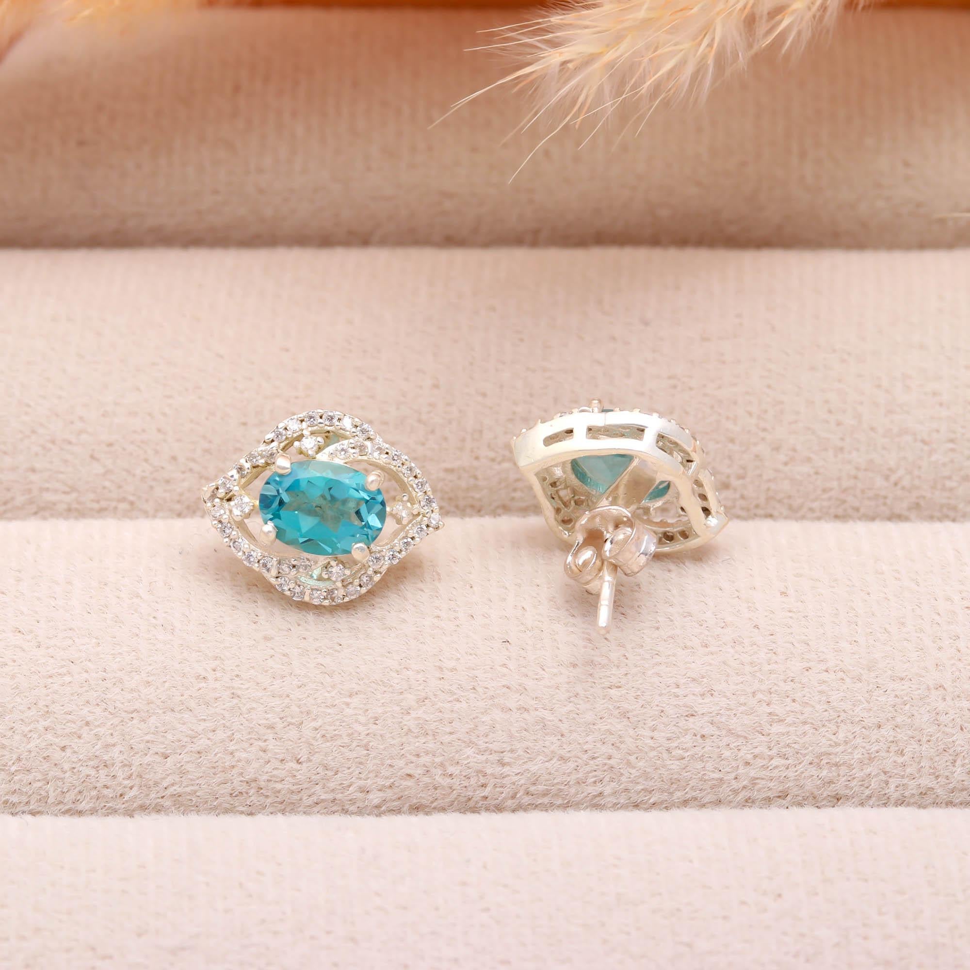 Sky Sparkle: Blue Topaz and Zircon Silver Stud Earrings