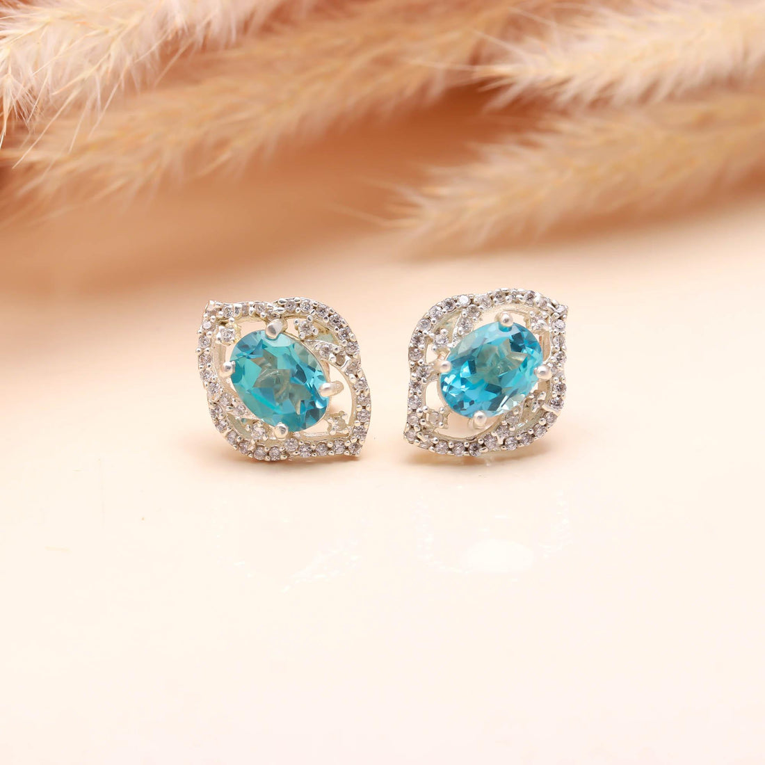 Sky Sparkle: Blue Topaz and Zircon Silver Stud Earrings