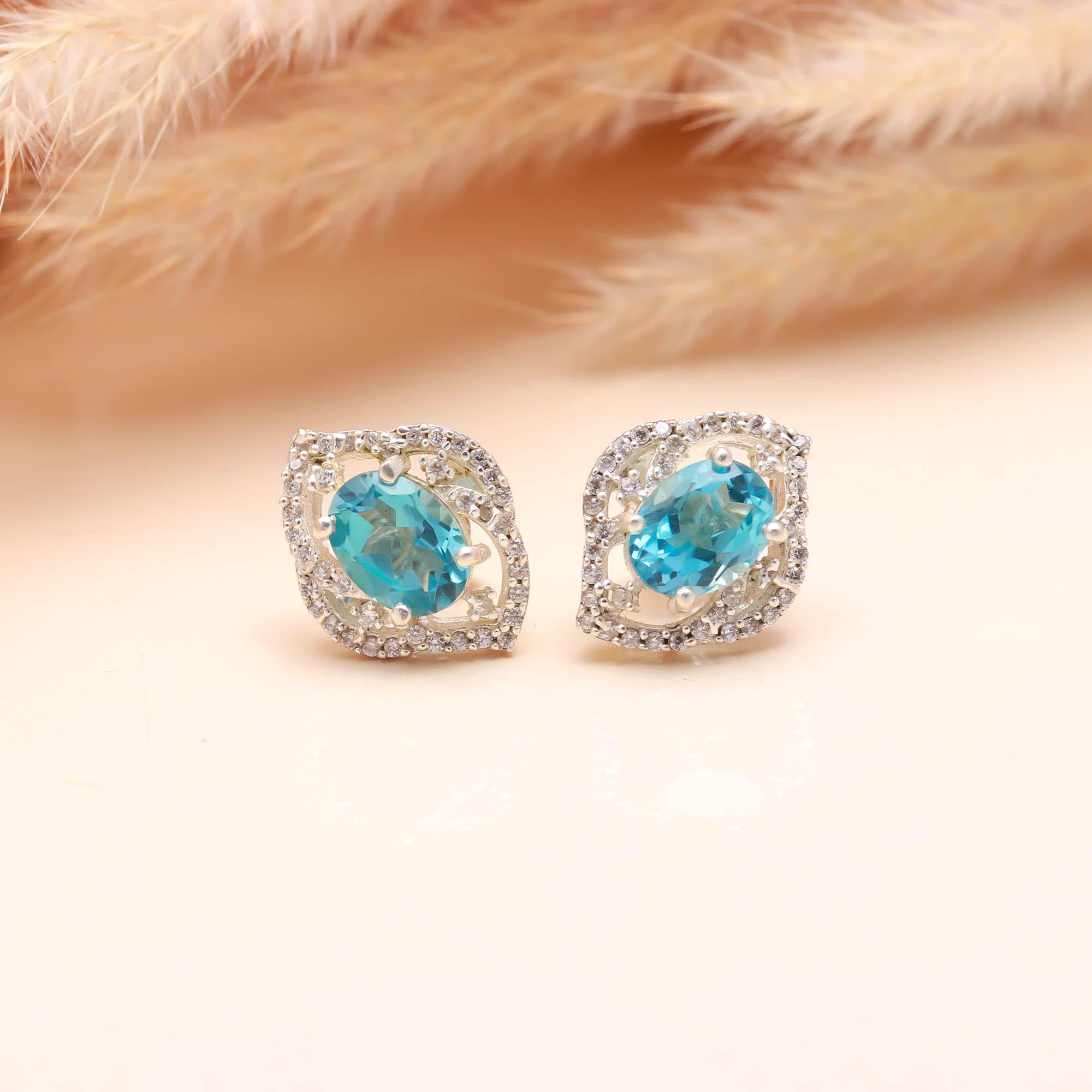 Sky Sparkle: Blue Topaz and Zircon Silver Stud Earrings